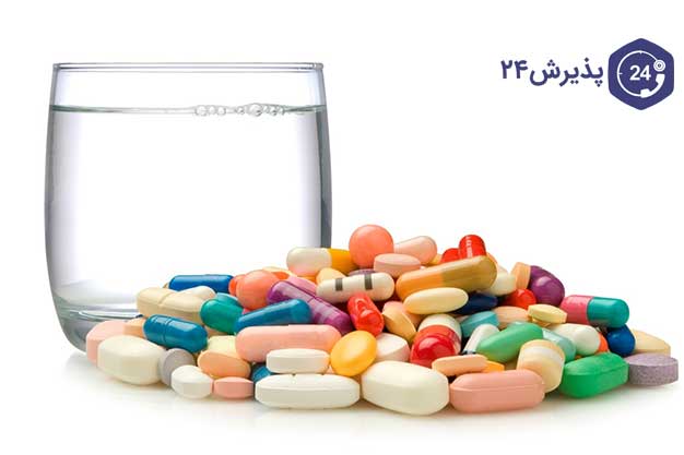 انواع قرص در کنار لیوان